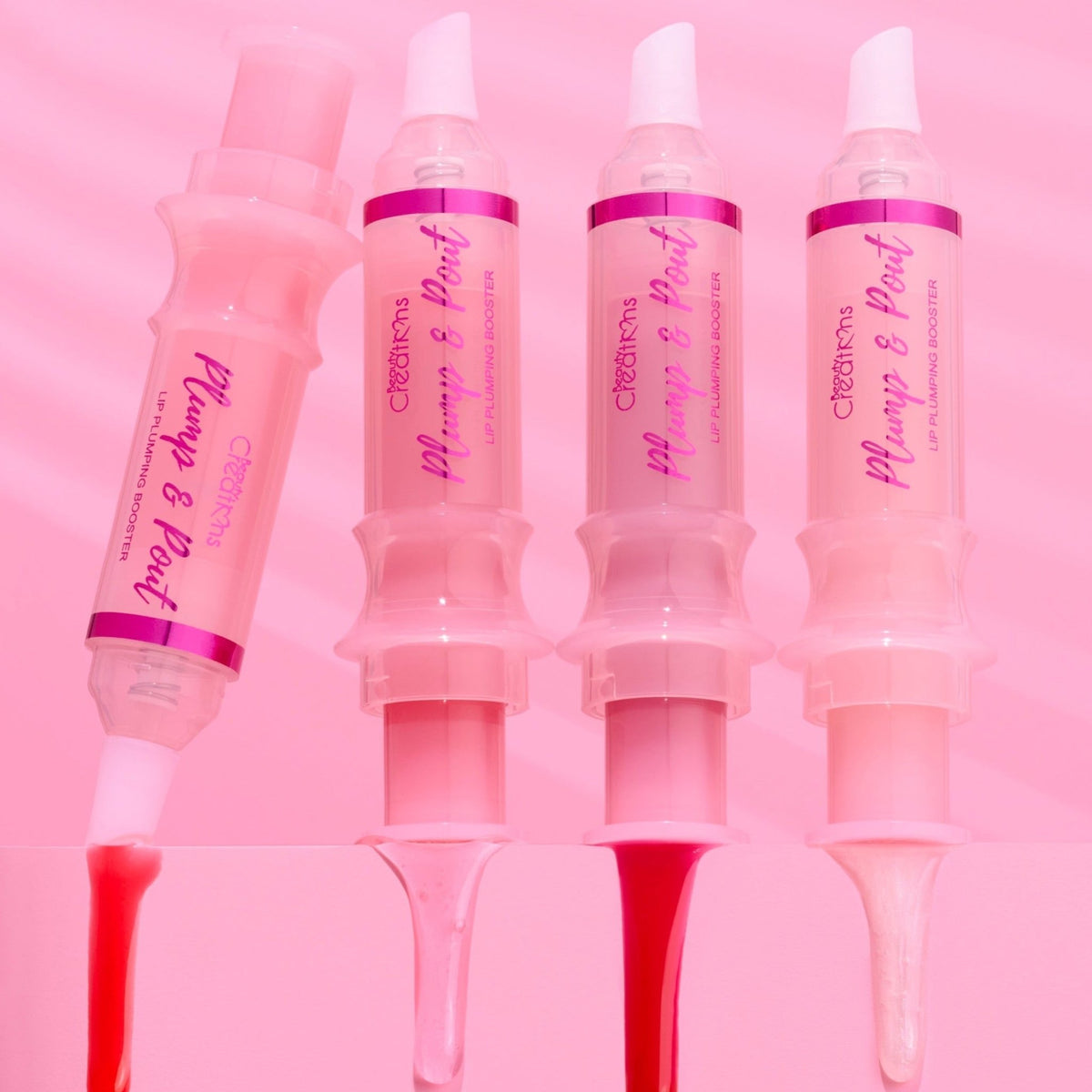 LIP GLOSS VOLUMEN PLUMP POUT BEAUTY CREATIONS